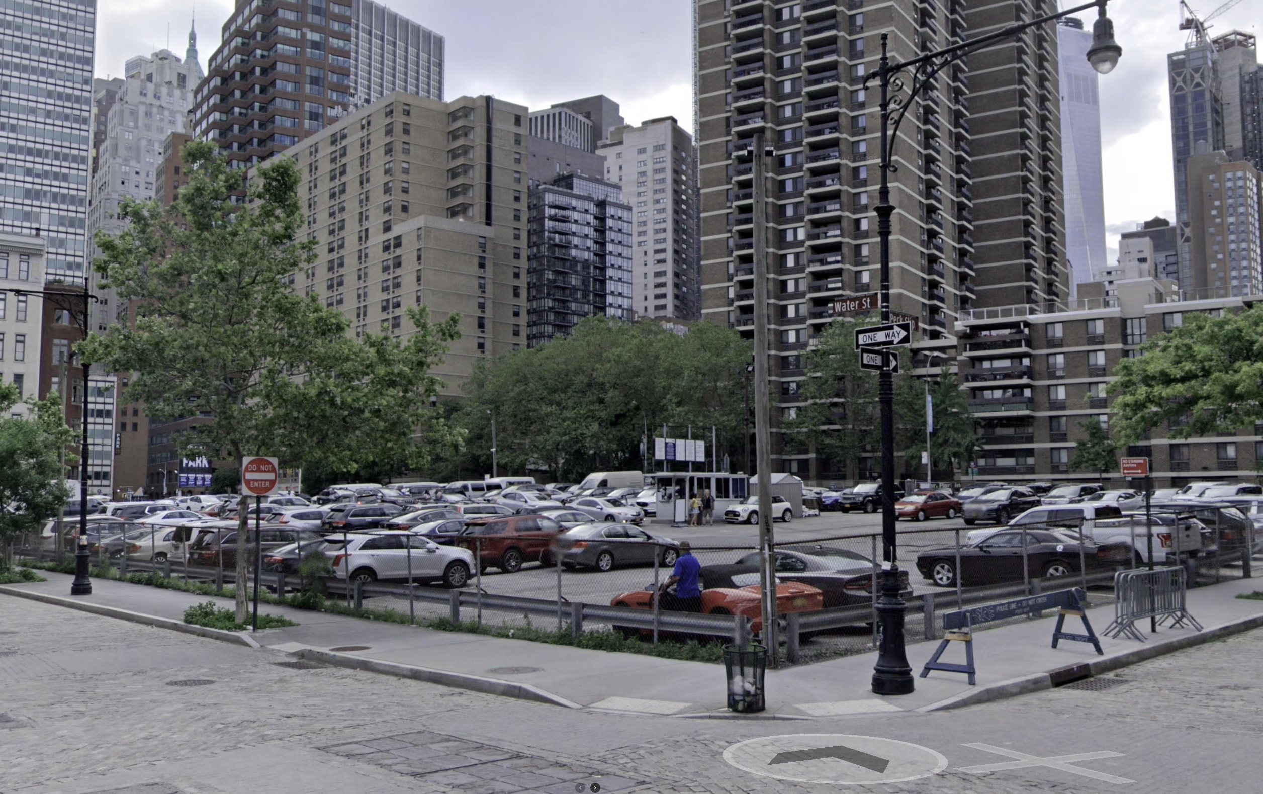 Aerial view of a surface parking lot in New York City near transit